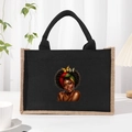 Black canvas tote bag featuring an artistic illustration of a woman with red headscarf - Black Graphic 4