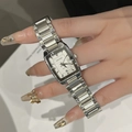 Silver square quartz watch for women with steel strap and date display on wrist - Silver Case White Dial