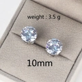 Macro shot of 10mm silver cubic zirconia stud earrings inside a grey jewelry box - 10mm / Platinum