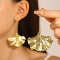 Statement golden ginkgo leaf dangle earrings with textured metallic finish for women - Ginkgo Leaf Shape (8690) / 14K Gold