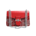 Red chain crossbody bag featuring traditional white floral embroidery and silver hardware - Red