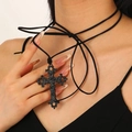 Close-up of gothic black carved cross pendant with long cord on model neck - Baroque Carved Long Cord Style (DZ-435-21)
