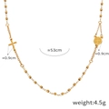 Collana minimalista a sfere dorate con croce e medaglia di San Benedetto in finitura oro - Stile P1926 / Oro