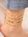 Four-piece gold ankle bracelet set featuring colorful daisy charms and pearls for women - Colorful - Anklet