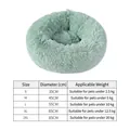 Size chart for mint green plush round dog bed showing diameters from 35cm to 85cm - L (Diameter 55cm) / Green