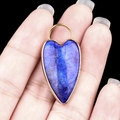 Lapis lazuli heart-shaped pendant with golden metal bezel for DIY jewelry projects - Lapis Lazuli
