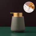 Nordic dark grey ceramic soap dispenser with a matte gold pump in a minimalist style - Rounded / Cyan Grey with Gold Pump