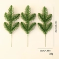 Pack of 3 artificial green pine branches for Christmas decor measuring 26cm in height - Artificial Pine Branches 3Pcs