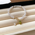 Bracelet élégant en perles plaqué or avec un charmant pendentif ananas en émail jaune - Ananas