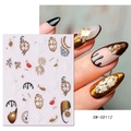 Détail de stickers à ongles 3D en relief avec horloges dorées et noires et flocons de neige - SW-5D112