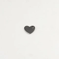 Polished black heart-shaped stainless steel pendant on a white marble background - Black