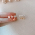 Elegant gold earrings with three small flowers inlaid with sparkling white zircons - Triple Flower Stud Earrings / Gold