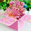 3D pink birthday explosion box card with pop-up balloons, cake, and gold glitter lettering - Pink Gold Stamped
