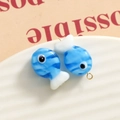 Macro shot of blue and white glass fish pendants with gold loops for DIY jewelry making - 3D Color Matching Fish / Sky Blue and White Striped