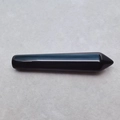 Polished natural black obsidian hexagonal crystal point for energy healing and massage - Obsidian