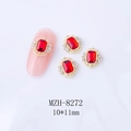 Détail macro de cristaux d'ongles octogonaux rouges 10x11mm avec cadres en alliage doré - 10*11mm Rouge Base Dorée (8272)