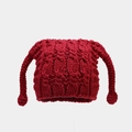 Detail of red chunky knit beanie featuring cat ears and long braided earflaps with pom-poms - Dark Red