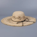 Detail of hand-woven raffia sun hat with hollow diamond patterns and frayed wide brim - M (56-58cm) / Beige