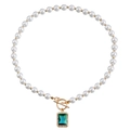 Elegant gold OT buckle pearl necklace featuring a rectangular emerald green gemstone pendant - Gold with Green Gemstone