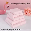 Slim pink jewelry gift boxes in a stacked arrangement with a height of 1.5cm - Light Pink Checkered Pattern With Nail Clips; 5*5*1.5cm