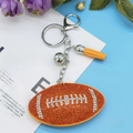 Orange rhinestone football keychain with yellow leather tassel and small silver bell - Orange (Stitched)