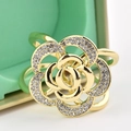 Elegant gold rose scarf ring with crystal accents on a light green jewelry box - 3D Rose Rhinestone