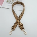 Close-up of adjustable woven chevron shoulder strap with gold metal hardware for bags - Light Pink Grey Brown + Gold Hook