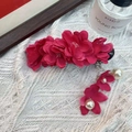 Elegant purple fabric flower hair clip with pearl tassels and floral pendant charms - Red Camellia Hair Clip