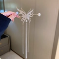 Silver butterfly hair stick with rhinestones and long tassel, held to show detail - Silver Butterfly Rhinestone Pearl Tassel Style (68#)