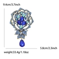 Detailed view of rhinestone rose brooch with dimensions 9.4cm by 5.8cm and weight info - Blue