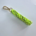 Handmade neon yellow braided paracord keychain with a gold metal lobster clasp - Fluorescent Green