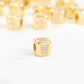 Detailed macro of 18k gold plated cube bead featuring a zircon-studded W letter - W (Single Pendant)