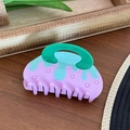 Acetate hair claw clip in purple and blue melt pattern with a green circular handle - 8.5cm / Blue and Purple