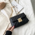 Classic black quilted crossbody bag with gold chain strap and square metal lock - Black