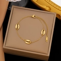Gold-plated stainless steel chain bracelet with elegant sea shell and conch pendants - Gold Stainless Steel Shell Bracelet (SLE2187)