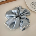 Light blue satin oversized scrunchie featuring elegant pearl trim and a silky finish - Blue