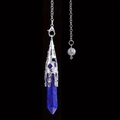 Detailed macro view of the lapis lazuli hexagonal crystal pendant with ornate silver filigree - Lapis Lazuli