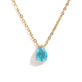 Macro detail of gold O-chain necklace with a teardrop blue zircon pendant in claw setting - Light Sea Blue Teardrop
