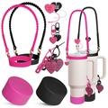 Close-up of pink silicone Stanley cup accessories including heart charms and protective boot - Pink Black Contrast Set