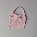 Close-up of pink halter yoga vest showing seamless ribbed texture and padded U-neck design - S / Pink