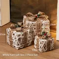 Three-piece set of white yarn Christmas gift boxes with burlap bows in 25cm, 21cm, 17cm - White Yarn Knitted Gift Box Set of 3