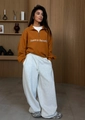 Detail of caramel brown quarter-zip sweatshirt with white Peace to the world embroidery - S / Orange