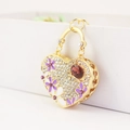 Golden heart purse keychain with white rhinestones and red gemstone detail - Purple
