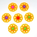 Detailed view of flower shaped fidget toys with colorful silicone bubbles and orange frames - Orange