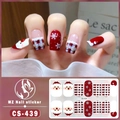 Close-up of Christmas gel nail stickers with Santa Claus and red plaid patterns - CS439