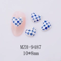 Macro detail of 10x8mm blue checkerboard heart nail charms with silver alloy edges - Blue White Checkerboard Silver Edge Large (9487)
