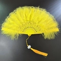 Elegant yellow feather folding fan with lace trim, ornate cutouts, and lotus tassel detail - Lace Feather Fan Yellow