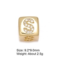Detailed macro view of 8mm gold letter S cube bead with micro-paved cubic zirconia - Letter S