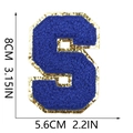 Detailed close-up of blue chenille letter S patch with gold sequin border and size markers - Letter S