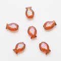 Macro detail of six reddish-brown fish-shaped glass beads for DIY jewelry making - Wine Red Plated